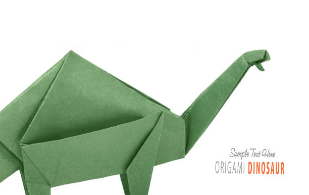 istock Isolated origami paper green dinosaur brontosaurus 860058138