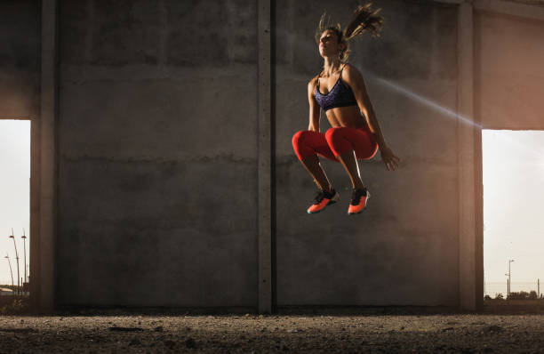 istock Determined athlete exercising high jumps in an old ruin. 860061502