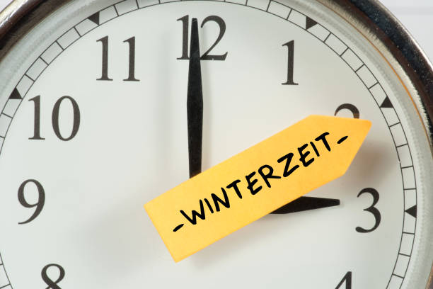 istock A clock shows the time change from summer time to winter time 860063780