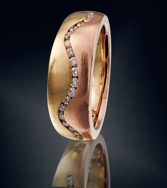 istock Golden ring with gemstone isolated on black background 860064132