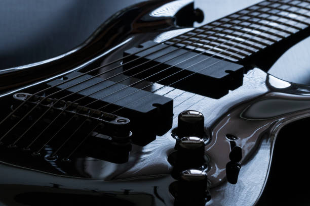 istock Black electric guitar detail macro 860064844