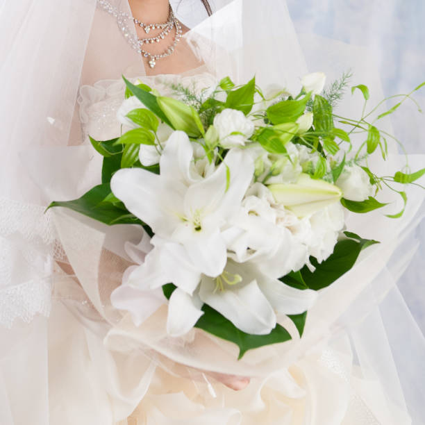 istock A lady's lily bouquet 860064878