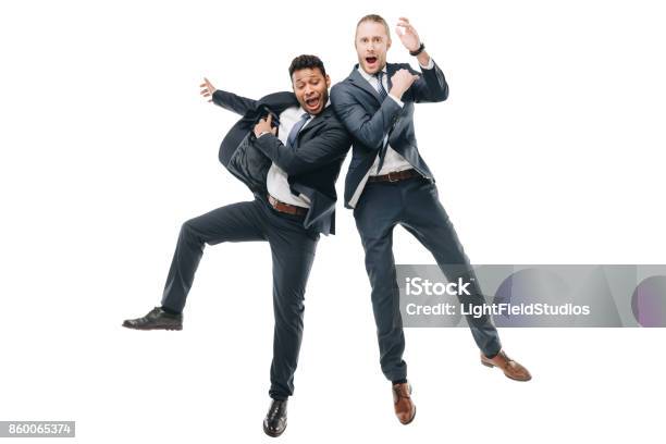 Happy Multiethnic Businessmen Stock Photo - Download Image Now - Jumping, Businessman, White Background