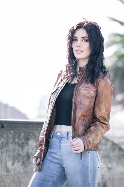 istock Brunette model wearing a casual outfit and looking pretty 860071952