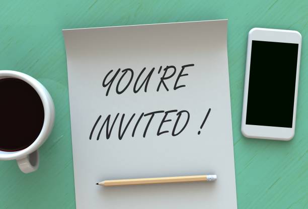istock You re Invited, message on paper, smart phone and coffee on table, 3D rendering 860073190