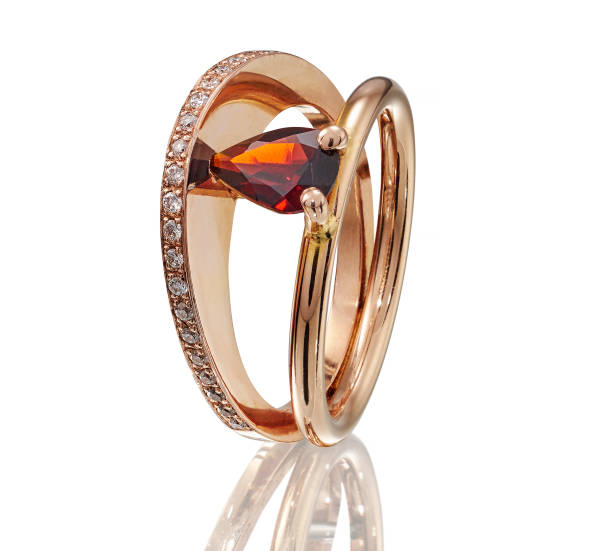 istock Golden ring with gemstone isolated on white background 860075894
