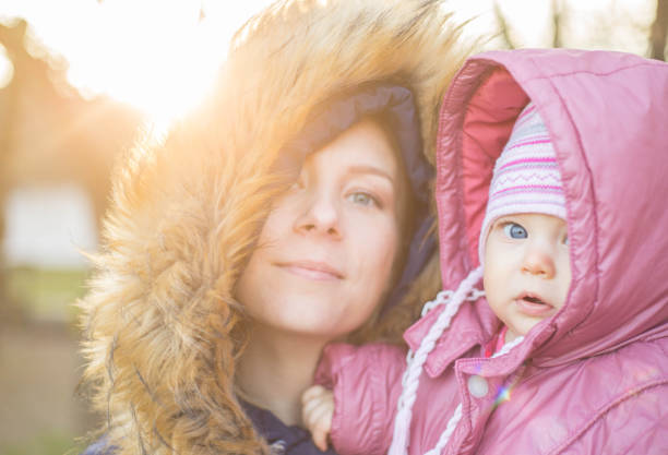 istock Mother and baby outside 860076702