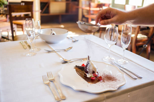 istock Poached pear form gourmet restaurant plated on a chocolate smear. 860079776