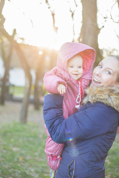 istock Mother holding baby 860081038