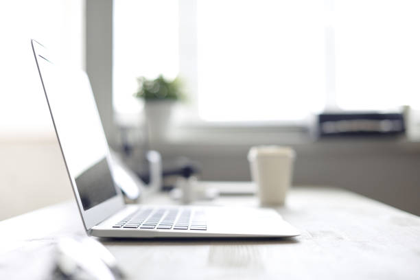 istock Designer's desk with a cup of fragrant coffee 860081434