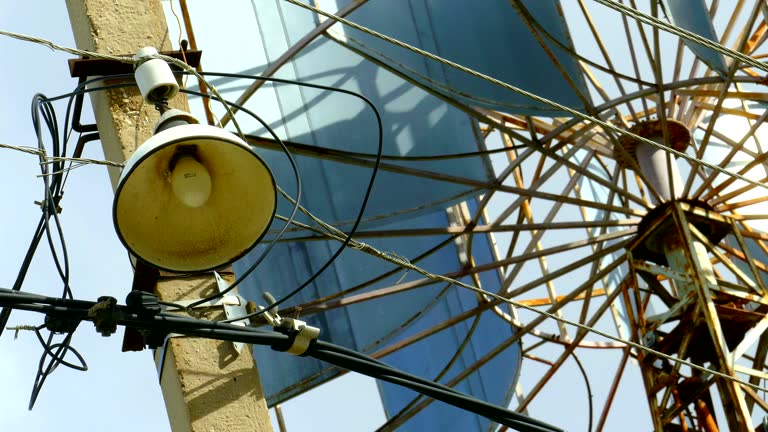 street lighting against a wind generator