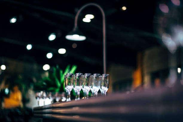 istock Luxury table settings for fine dining with and glassware, beautiful blurred  background. Preparation for holiday  Christmas and Hannukah dinner night. 860084314