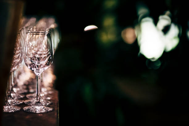 istock Luxury table settings for fine dining with and glassware, beautiful blurred  background. Preparation for holiday  Christmas and Hannukah dinner night. 860088916