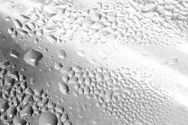 istock abstract background of drops on gray glass 860089092