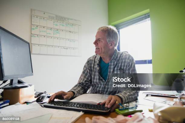 Senior Working From Home Stock Photo - Download Image Now - Nontraditional student, Messy, Residential Building