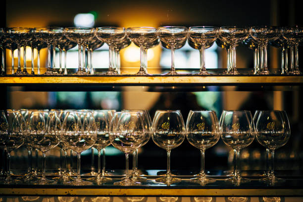 istock Luxury table settings for fine dining with and glassware, beautiful blurred  background. Preparation for holiday  Christmas and Hannukah dinner night. 860089472