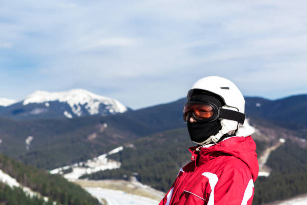 istock skier standing on top of a mountain 860089914