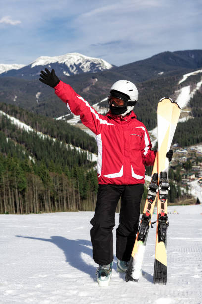 istock skier stands on top of the mountain 860090166