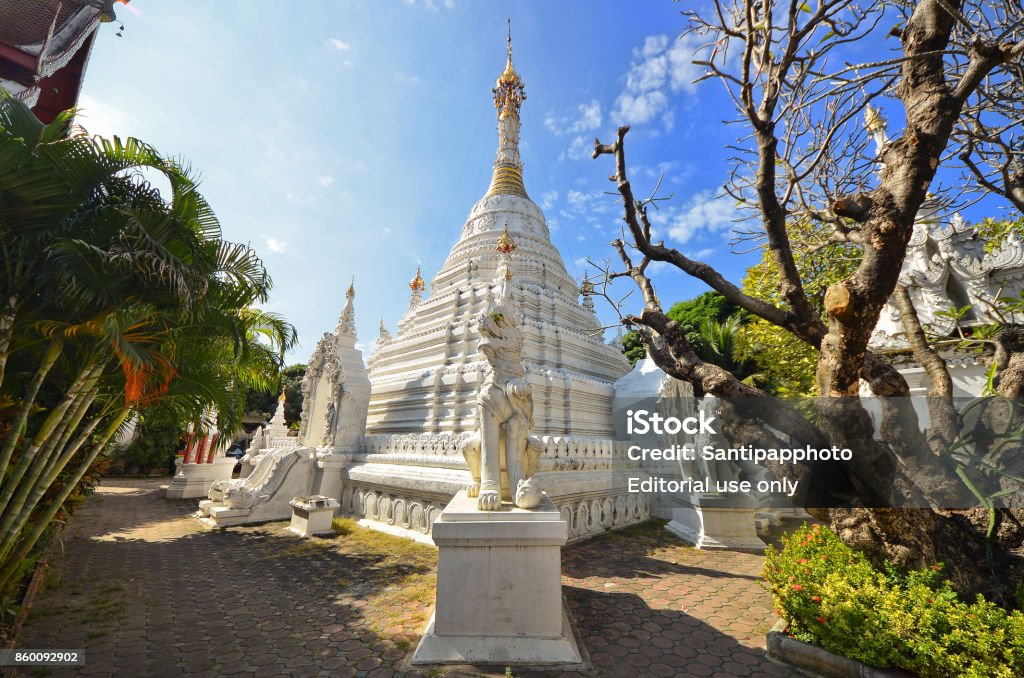 White Burmese pagoda style CHIANG MAI, THAILAND - DECEMBER 22, 2016 : White Burmese pagoda style in Wat Mahawan (Mahawan temple). Ancient Stock Photo