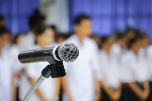 istock microphone on stand Close up in conference room :Select focus with shallow depth of field. 860093108
