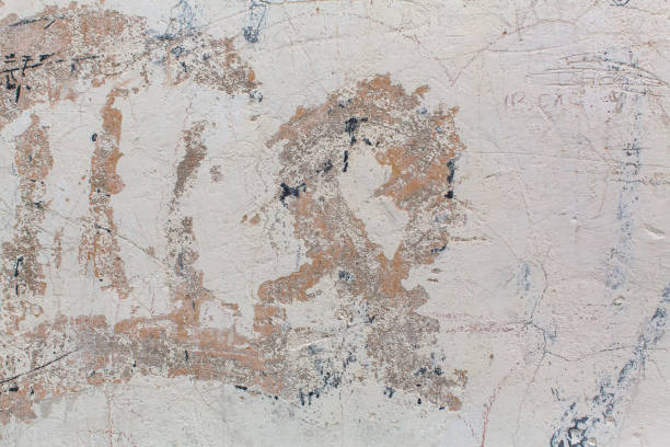 istock Texture of stone wall with peeling paint. 860093800