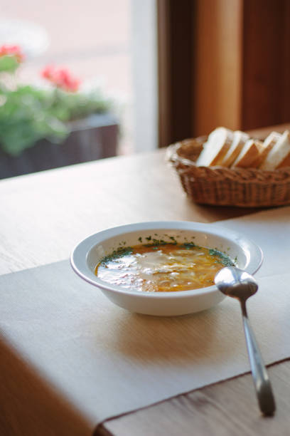 istock Nice and hot soup at the white ceramic plate at the restaurant. 860096526