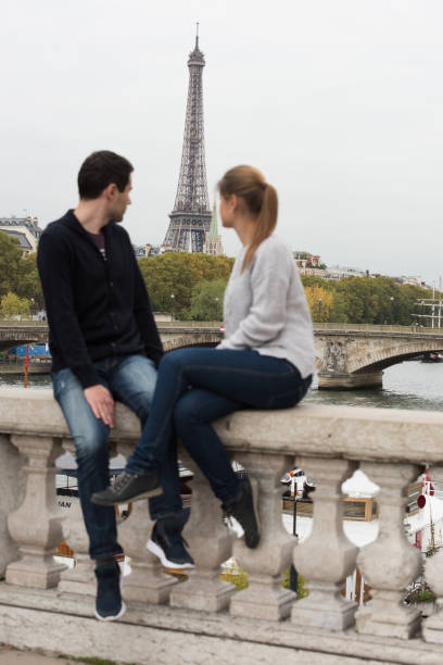 istock young couple in Paris on the bridge 860097232