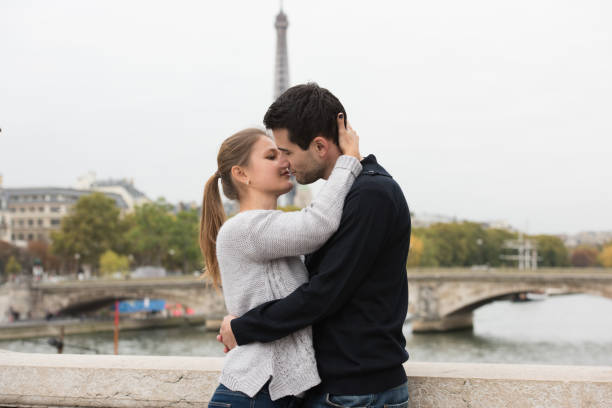istock young couple in Paris kissing 860097290