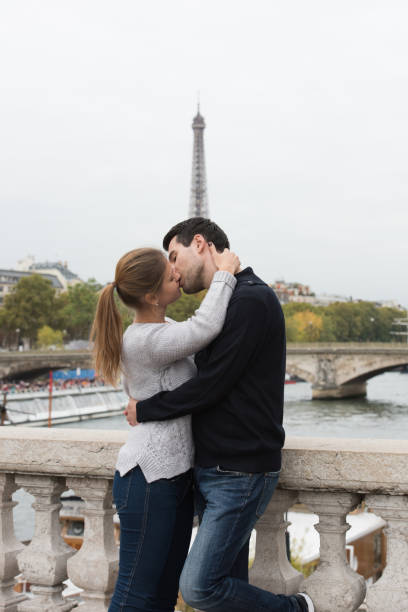 istock young couple in Paris kissing 860097298