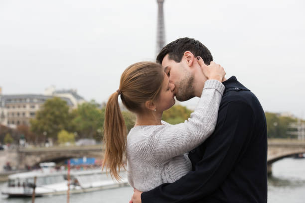 istock young couple in Paris kissing 860097320