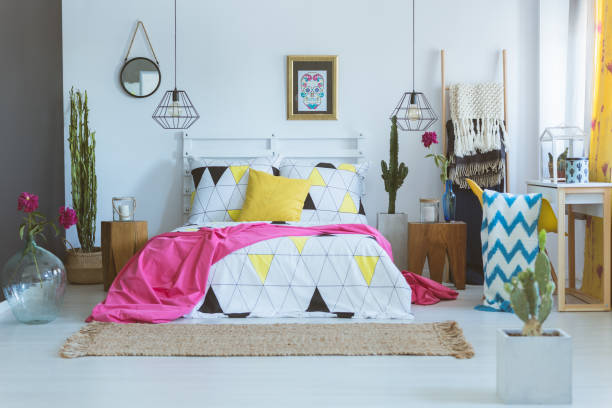 istock King-size bed in unique bedroom 860097378
