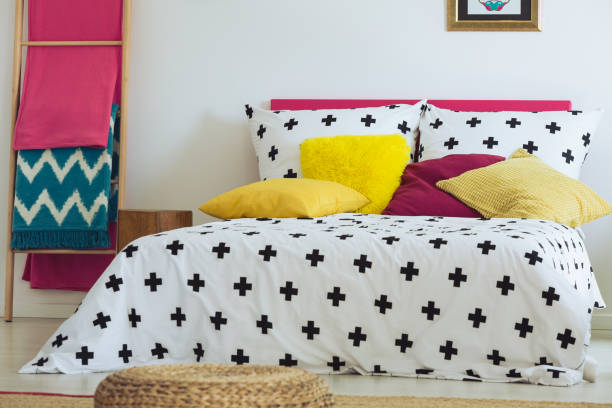 istock Mexican bedroom with braided pouf 860097430