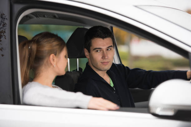 istock young couple in a car 860100932