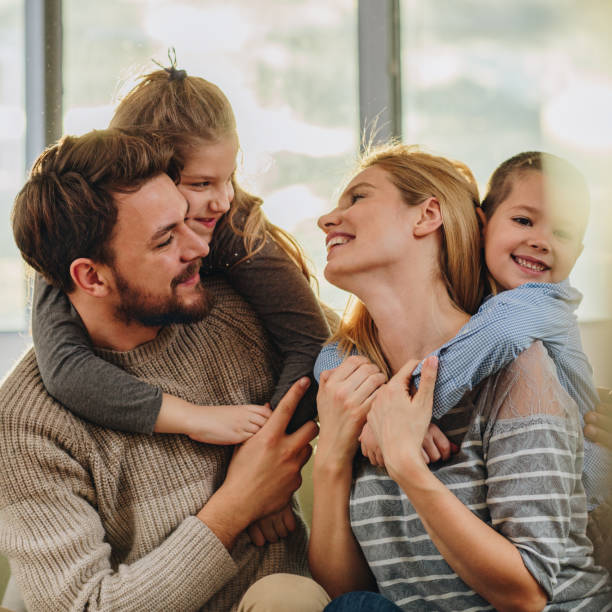 istock Young loving family communicating while spending time together. 860103760