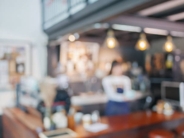 istock Coffee shop blurred with barista background. 860104774