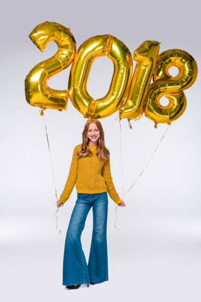 istock girl with 2018 balloons 860105314