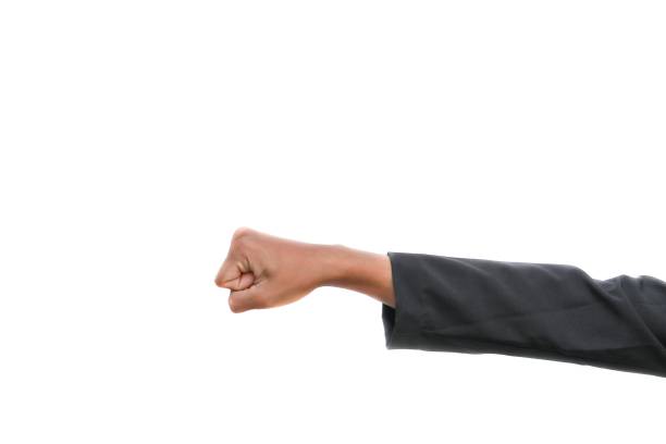 istock hand showing punch fist strong on white background 860106054