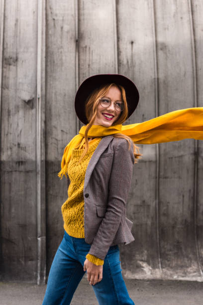istock beautiful girl in hat and scarf 860106366