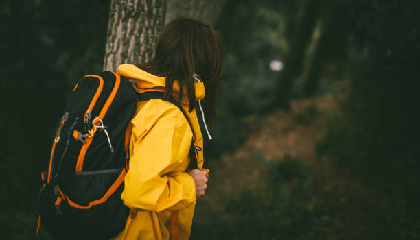 istock Woman walking in the forest 860109484