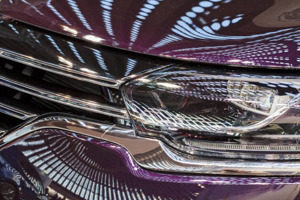 istock headlights under the reflection of lights 860113518