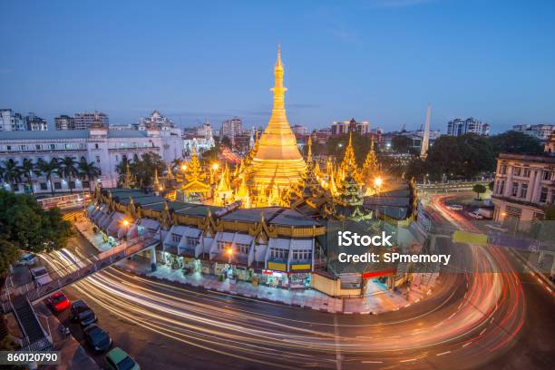 Yangon The Old Capital City Of Myanmaryangon Traffic With Long Exposure At Sule Pagoda Famous Landmark After Sunset Yangonmyanmar Stock Photo - Download Image Now