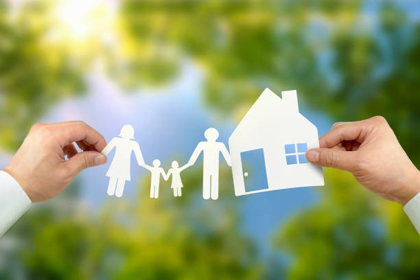 istock Hand hold house and family 860121336