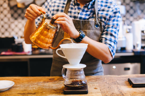 istock Hipster Barista making hand drip Coffee 860122444