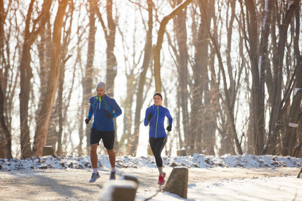 istock Two person jogging in nature 860125014