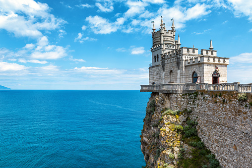 Crimea - May 18, 2016: The castle Swallow's Nest on the rock over the Black Sea in Crimea, Russia. This castle is a symbol of Crimea.