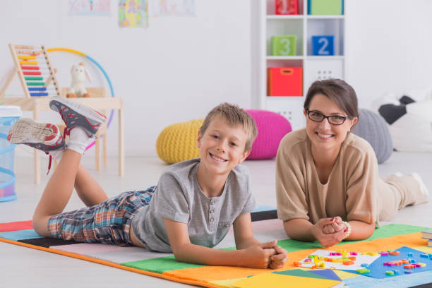 istock Happy psychotherapist and patient 860126576