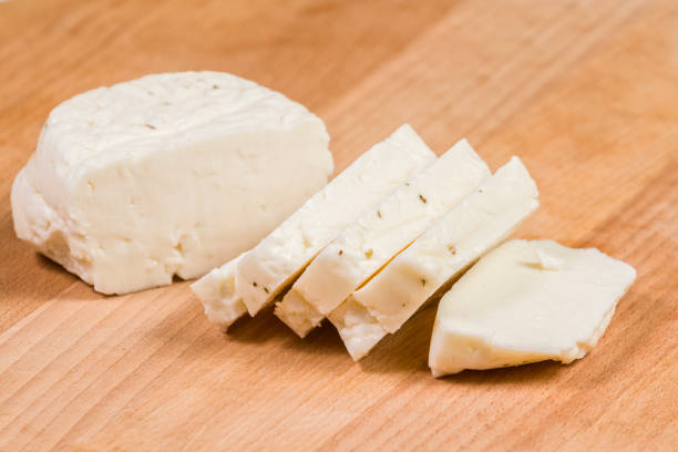 istock Fresh sliced halloumi cheese from Cyprus on a wooden board 860129708