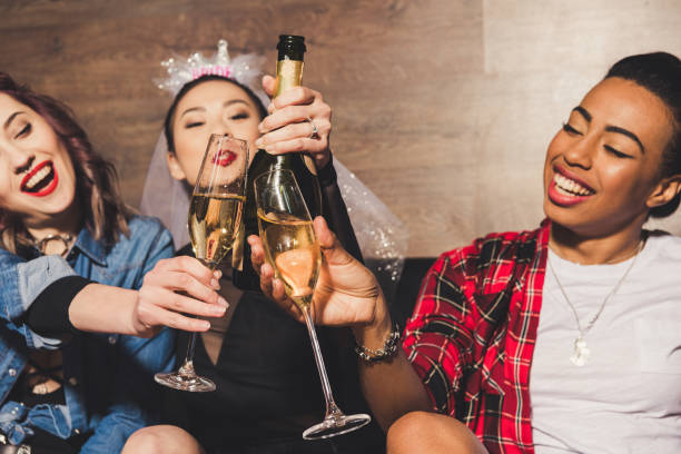 istock multicultural women having fun at hen party 860129762