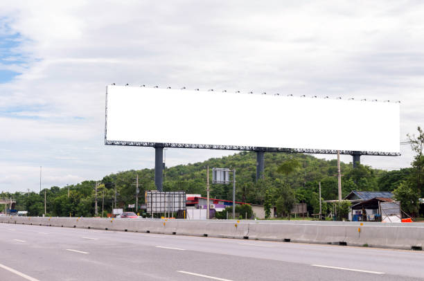 istock Blank billboard for new advertisement beside the road 860136450