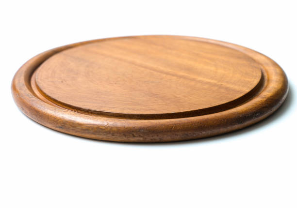 istock Circle wood plate isolated on white background 860136624